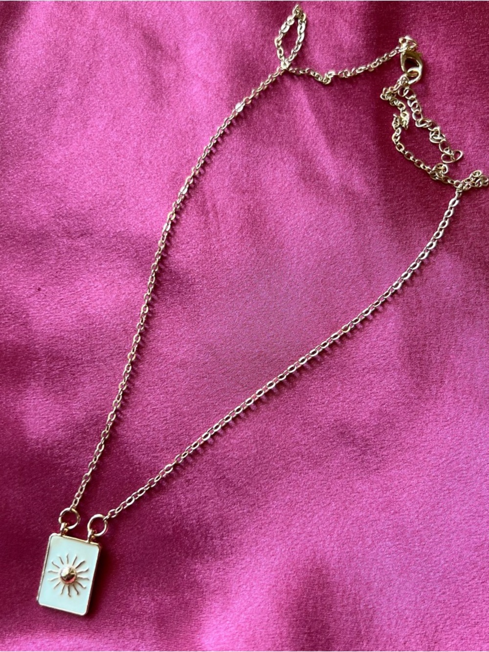 Gold-Tone Sunburst Pendant Necklace in White Enamel